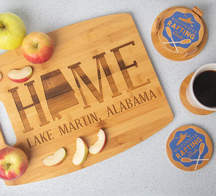 bamboo cutting board and coasters with an apple and mug